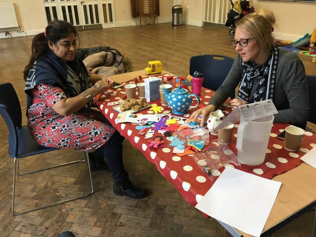mums having tea and doing crafts at Kids Matter booster session