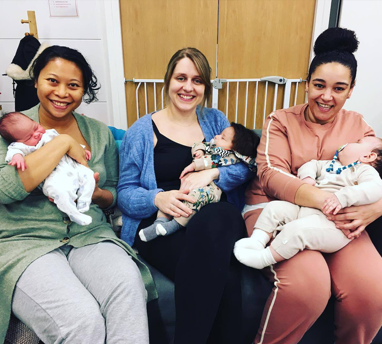 smiling mums holding small babies at Babies Matter parent group